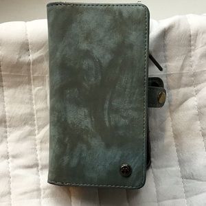 Case me I iPhone 7 wallet case. Green. Perfect condition.
